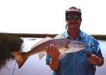 Author, Capt. Steven Holmes, with another Mosquito Lagoon redfish.